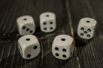 dice on a black table