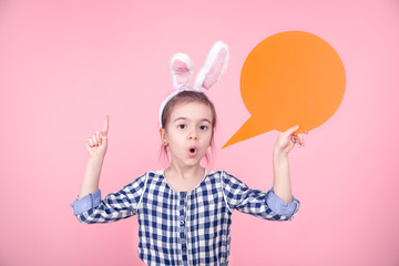 Easter portrait of a cute little girl with space for text.