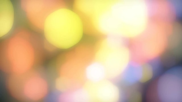 Abstract hexagon bokeh defocused looping background. Soft blurred light leak colorful lights. Holiday warm shiny motion dynamic to improve your shots. 4k 30fps