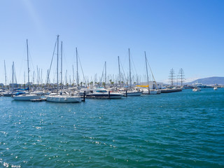 Fototapeta na wymiar Bay with yachts and ships off the coast of Spain