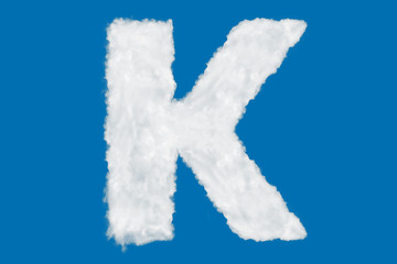 Letter K font shape element made of clouds on blue background over sky