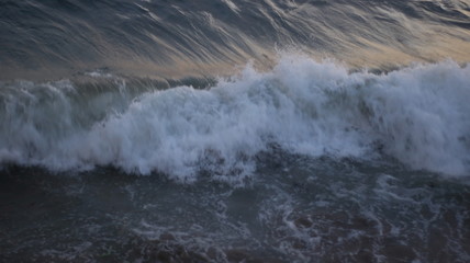 waves crashing on the beach