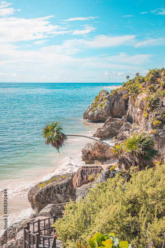 Wall mural tulum archaeological site and the caribbean ocean. ancient mayan pyramids located in riviera maya, m