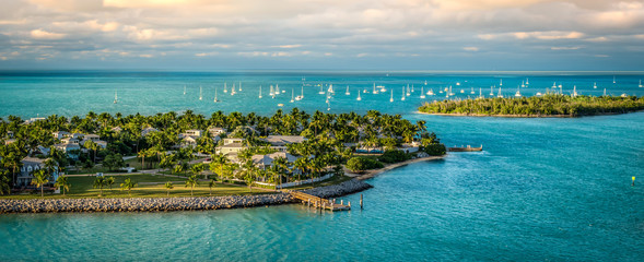 Panoramic sunrise landscape view of the small Islands Sunset Key and Wisteria Island of the Island of Key West, Florida Keys. - obrazy, fototapety, plakaty