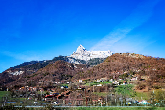 View of Mont-Blanc mountain peaks and Passy village in Upper Savoy department in the Auvergne-Rhone-Alpes region in south-eastern France