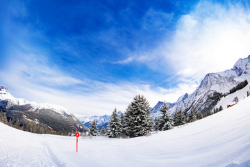 Alpine ski slope and view Mont-Blanc, Chamonix region, Auvergne-Rhone-Alpes in south-eastern France