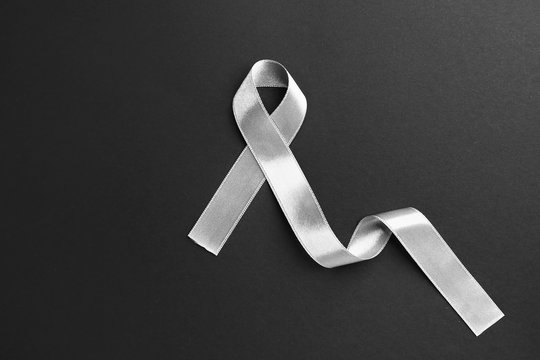 Silver ribbon on dark background