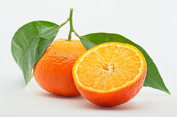 Fresh tangerines on white background. Studio shot.