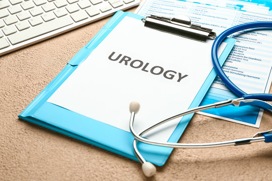 Paper sheet with text UROLOGY and stethoscope on color background