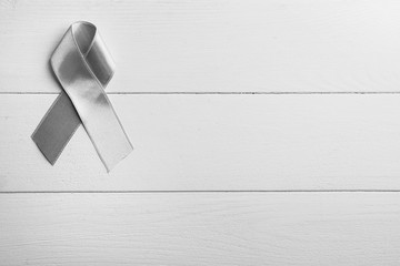 Parkinson's awareness ribbon on white background