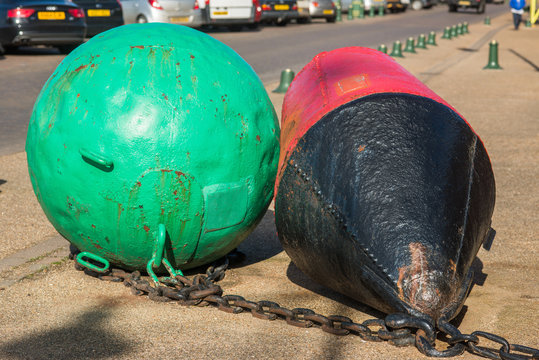 Colourful buoys at Purfleet Quay in Kings Lynn, Norfolk, UK.