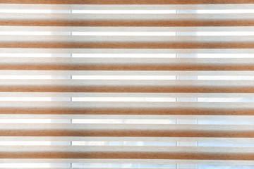 Modern blinds hanging on window