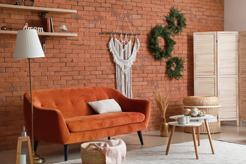 Stylish interior of living room with Christmas decor