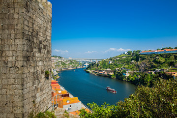 Fernandine Wall of Porto and the  Douro River next to the Dom Luis I Bridge in a beautiful sunny day
