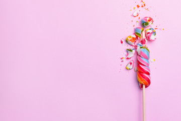 Crushed lollipop on color background - obrazy, fototapety, plakaty