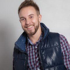 Handsome young elegant man studio portrait.