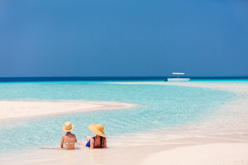Mother and daughter at beach