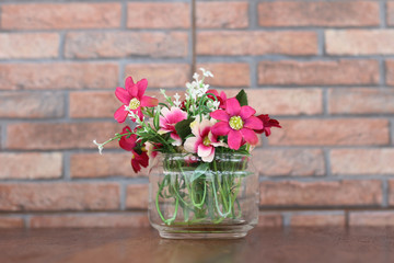 flower vase placed on the table at cafe