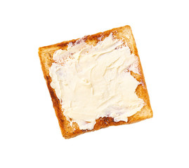 toasted bread and butter isolated on white background, top view