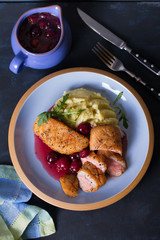Duck breast with cherry wine sauce and mashed potato. View from above, top view