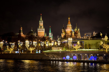 Moscow Kremlin, St. Basil&rsquo;s Cathedral and Zaryadye Park across the Moscow River. The embankment of the river and the streets are decorated for the new year 2020