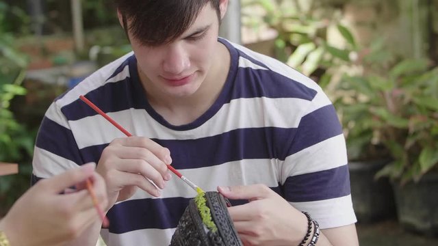 Young Man Painting Lao Lacquerware Handicraft