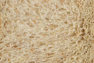 Close-up of healthy whole wheat bread for background texture.