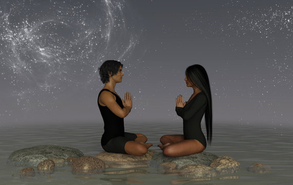 A couple practicing yoga on rocks in water