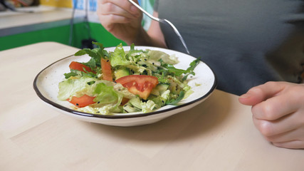 fashion food design. vegetable salad with rucolla and avocado