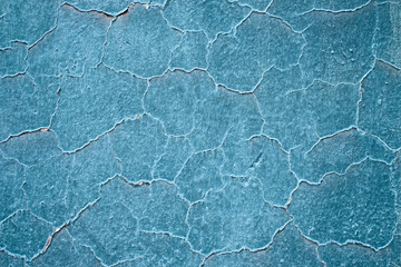 Empty blue pastel background element with cracked and perched irregular texture.