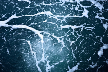 Deep blue turbulent water surface.