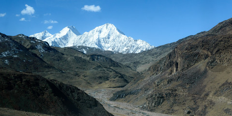 V-shaped spur hill ridges of Pirin mountains valley. A zig zagging fluvial valley that interlock or overlap in a staggered manner. V-shaped valley that extends into a concave bend from opposite side.