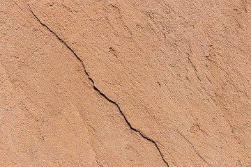 Sand and stone surface. Abstract stone background for wallpaper.Detail of surface texture with small pebble rock on dirty ground.