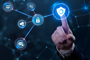 Cyber security data protection business technology privacy concept. Young businessman  select the icon security on the virtual display.