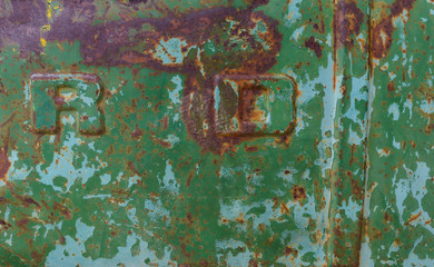 Grunge green iron rust texture background with scratches.