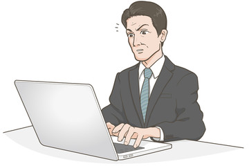 パソコンで仕事をするビジネスマン怒り