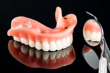 Teeth model showing an implant crown bridge model/ dental demonstration teeth study teach model.