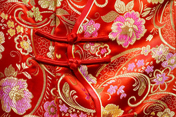 close up of traditional red chinese jacket 
