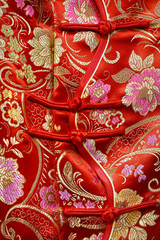 close up of traditional red chinese jacket 