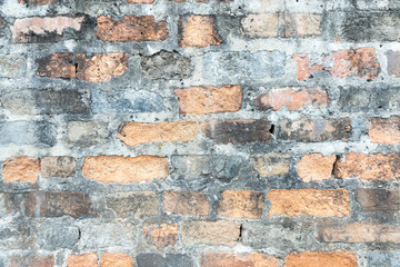 old crack obsolete brick wall with gray stone cement stained background texture nobody.