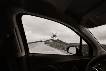 Windmill viewed through car