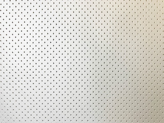 Leather background. Detail of perforated car seat