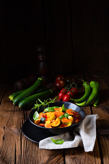 zucchini vegetarian ratatouille with tomato sauce and herbs