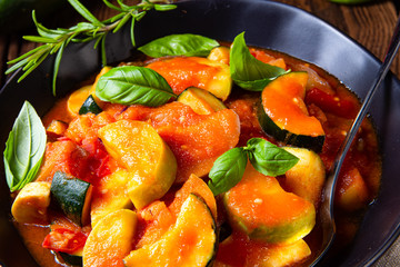 zucchini vegetarian ratatouille with tomato sauce and herbs