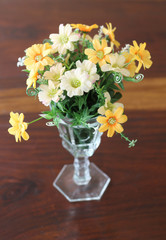 flower vase placed on the table at cafe