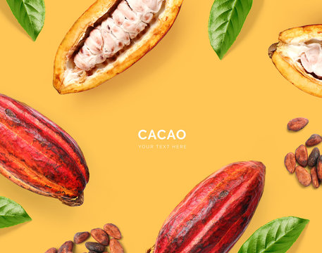 Creative layout made of cacao beans and  cacao fruit on the yellow background. Flat lay. Food concept. Macro  concept.
