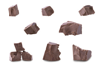 Set of dark broken chocolate pieces isolated on white background