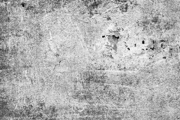 Texture of a concrete wall with cracks and scratches which can be used as a background