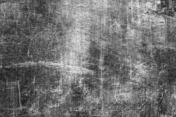 Texture of a concrete wall with cracks and scratches which can be used as a background