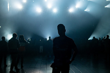 silhouette of man at concert